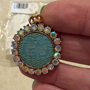 Gold Pendant with Blue Center and Crystal Accents